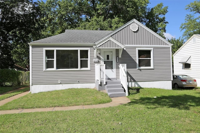 view of front of home with a front yard