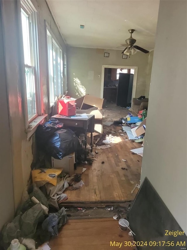 misc room with ceiling fan and hardwood / wood-style floors