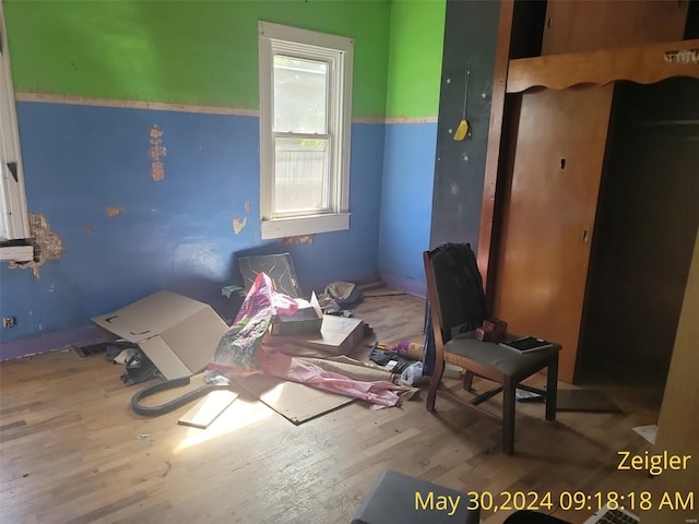 bedroom with light wood-type flooring