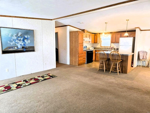 kitchen with hanging light fixtures, ornamental molding, a breakfast bar, electric stove, and white fridge