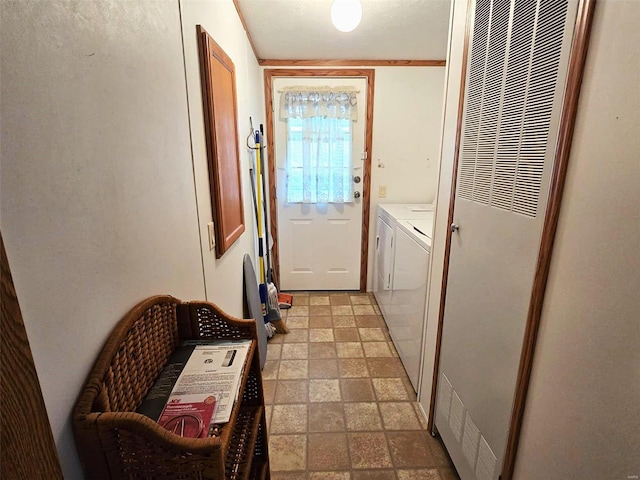 laundry room with separate washer and dryer