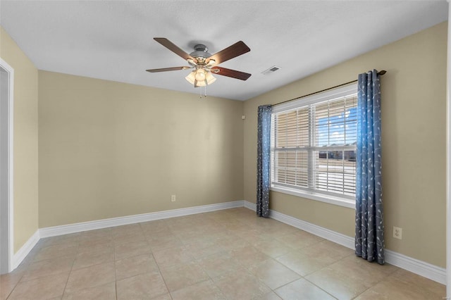 unfurnished room featuring ceiling fan