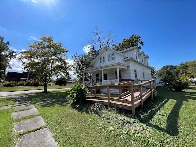 exterior space featuring a yard and a porch