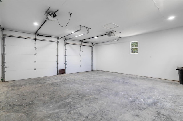 garage featuring a garage door opener