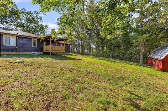 view of yard with a deck