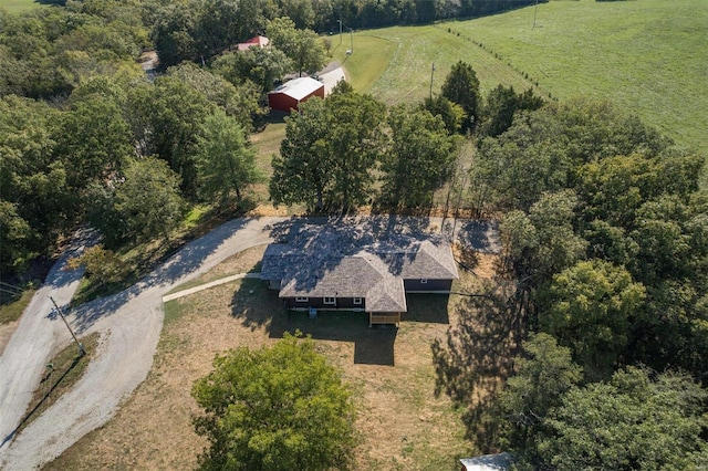 birds eye view of property featuring a rural view