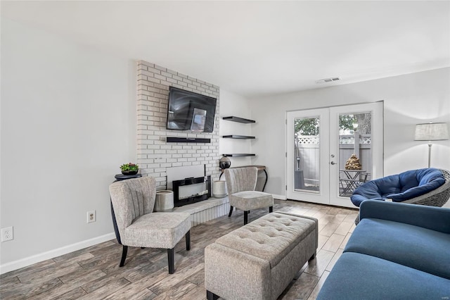 living room featuring french doors and wood-type flooring