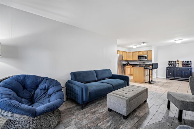 living room with light hardwood / wood-style floors