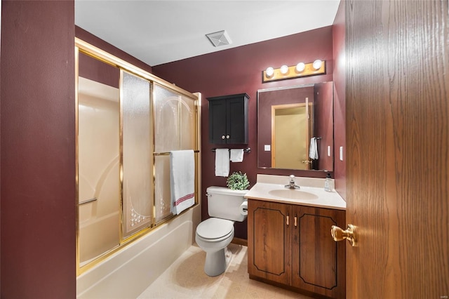 full bathroom featuring toilet, combined bath / shower with glass door, and vanity