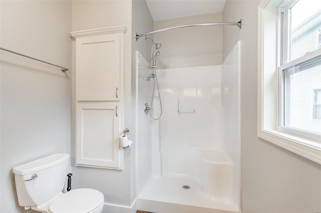 full bath with toilet and a shower