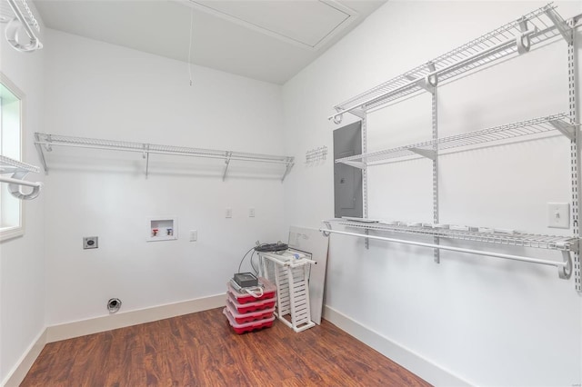 laundry area featuring hookup for an electric dryer, laundry area, attic access, wood finished floors, and hookup for a washing machine