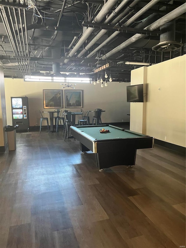 game room with pool table and dark hardwood / wood-style flooring