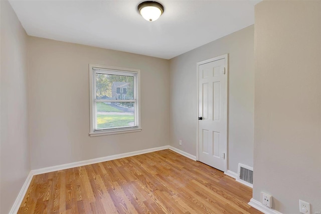 empty room featuring light hardwood / wood-style floors