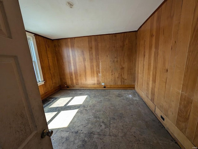 empty room with wood walls