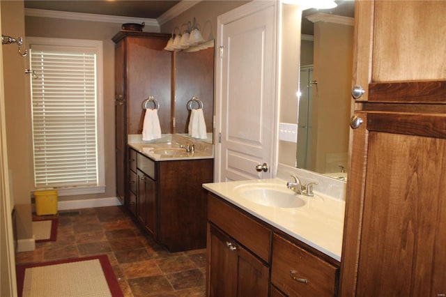 bathroom with vanity and ornamental molding