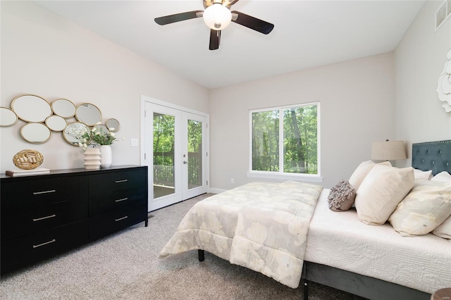 bedroom with light carpet, ceiling fan, access to outside, and french doors