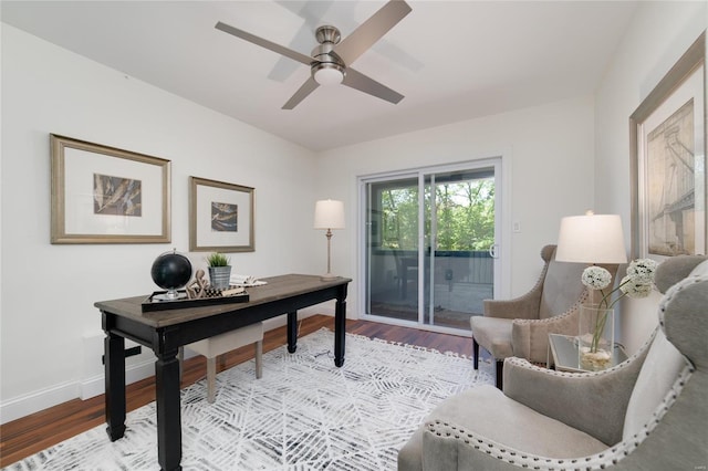 office area with light wood-type flooring and ceiling fan