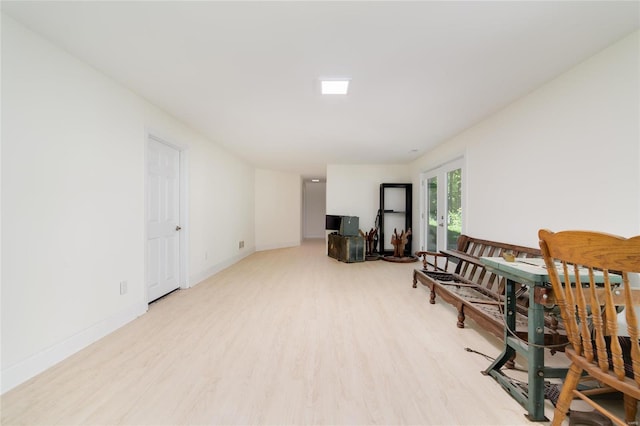 interior space featuring french doors and light wood-type flooring