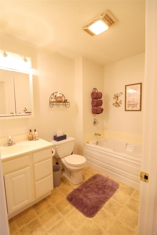 bathroom with a bath, tile patterned flooring, vanity, and toilet