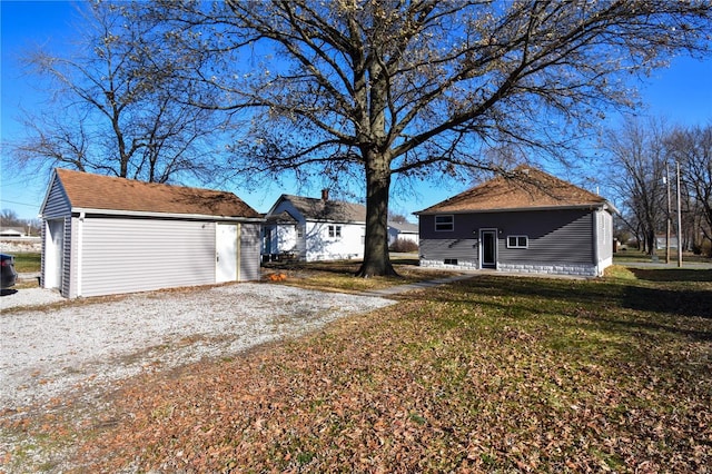 exterior space with a yard and an outdoor structure