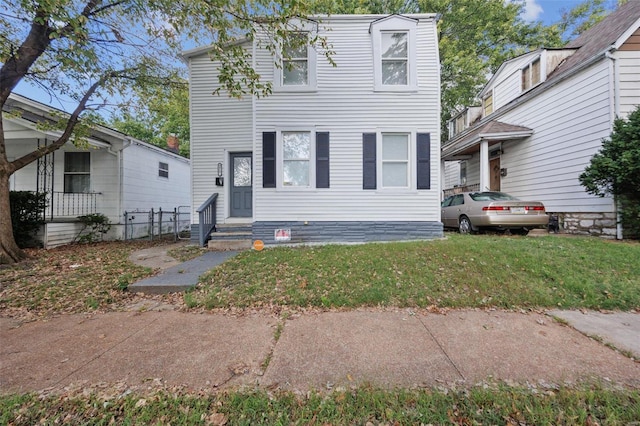 view of front of house with a front lawn