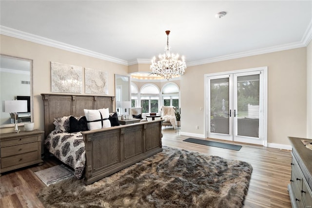 bedroom featuring crown molding, a chandelier, and dark hardwood / wood-style flooring