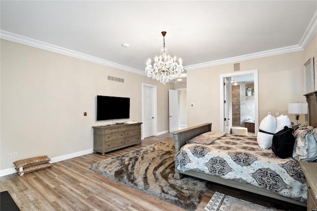 bedroom featuring wood-type flooring, ornamental molding, a chandelier, and ensuite bathroom