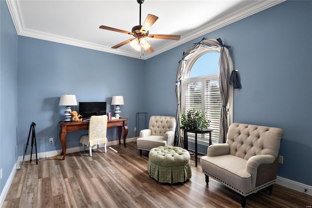 office featuring ceiling fan, hardwood / wood-style flooring, and crown molding