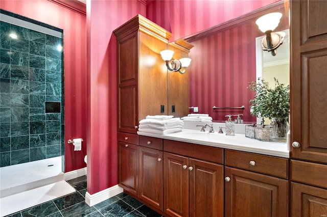 bathroom with a shower, ornamental molding, vanity, and toilet