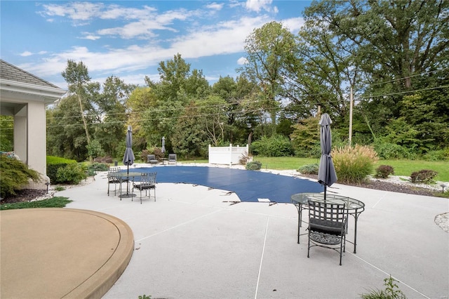 view of swimming pool featuring a patio