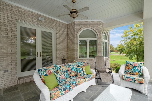 view of patio featuring ceiling fan