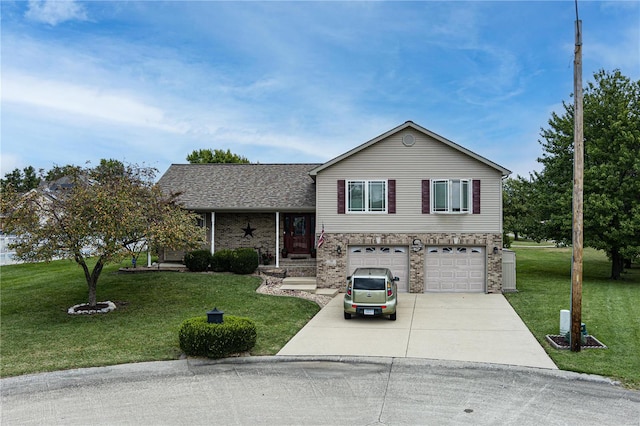 split level home with a garage and a front yard