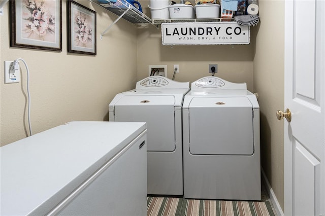 washroom featuring separate washer and dryer