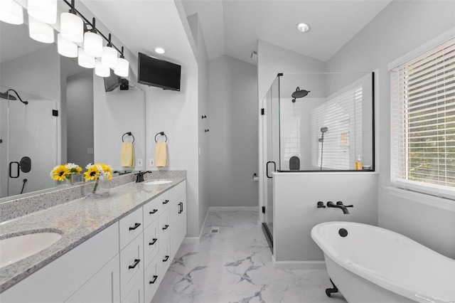 bathroom with shower with separate bathtub, vaulted ceiling, and vanity