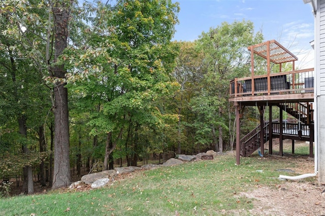 view of yard with a deck