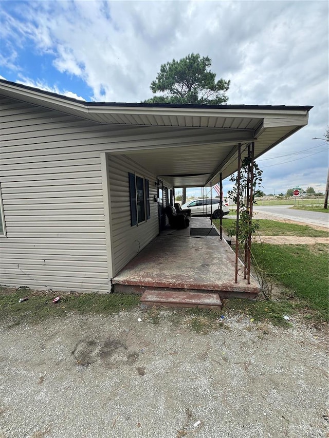 view of car parking featuring a carport