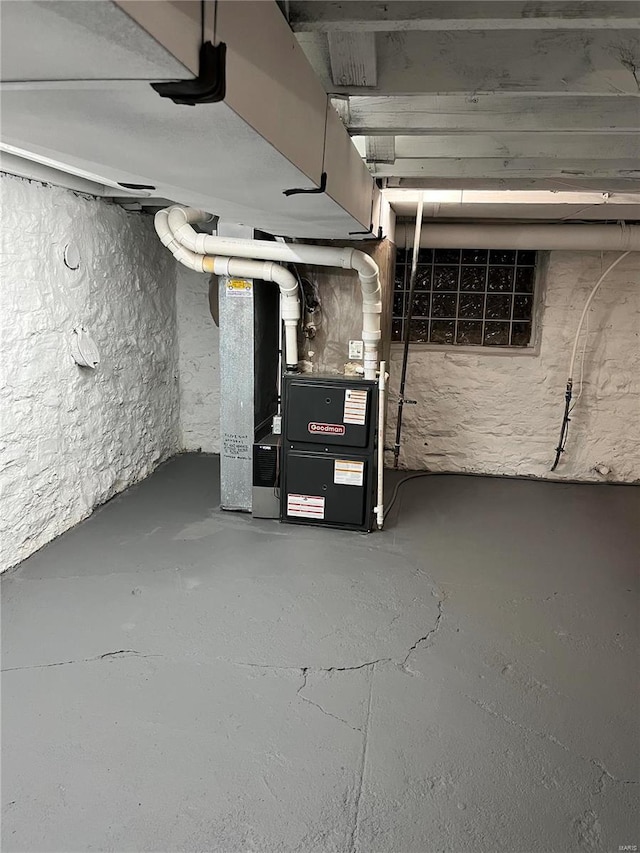 basement featuring heating unit