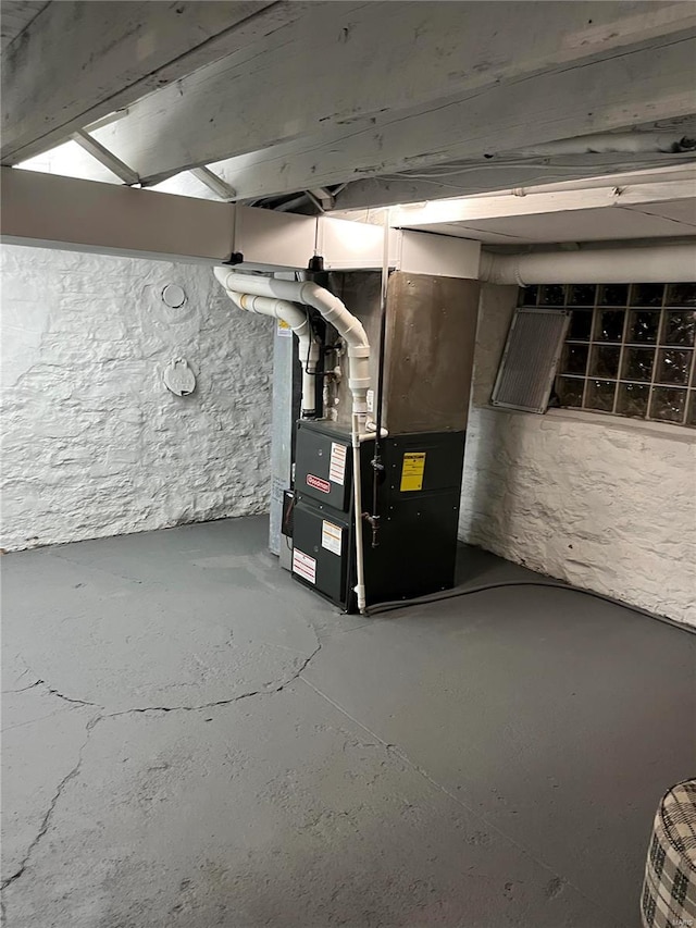 basement featuring heating unit