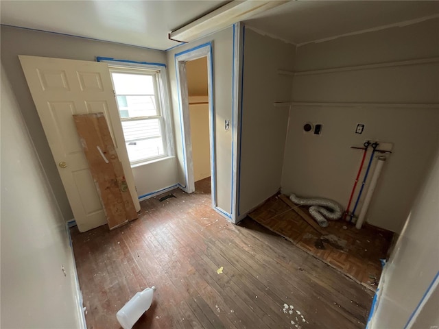 clothes washing area with hookup for a washing machine and hardwood / wood-style floors