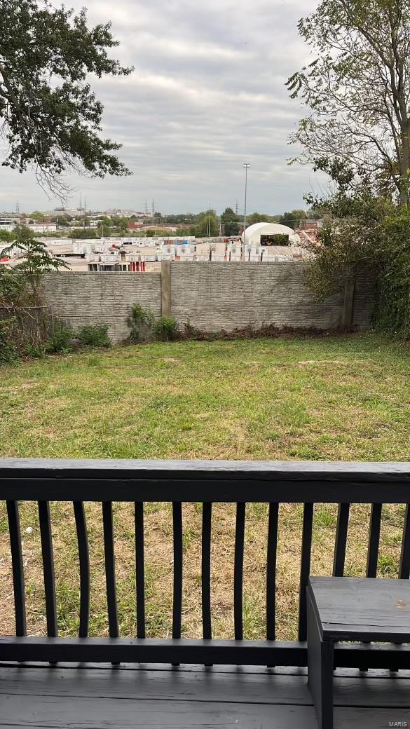 view of yard featuring a balcony