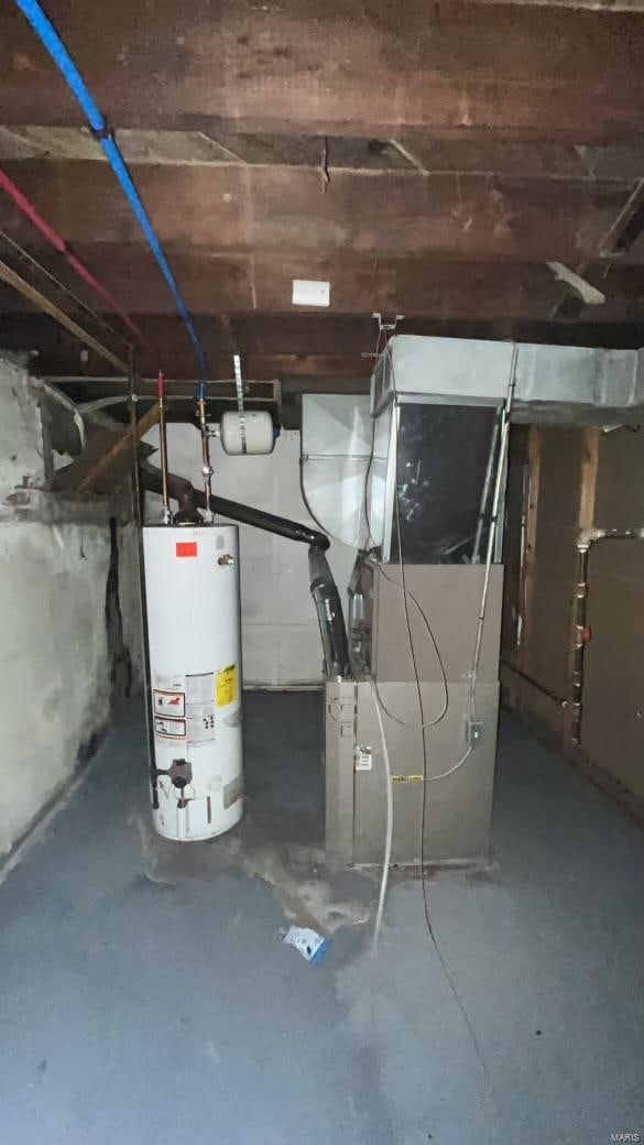 utility room with gas water heater