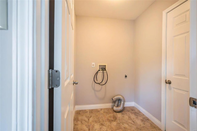 clothes washing area featuring hookup for a washing machine and hookup for an electric dryer