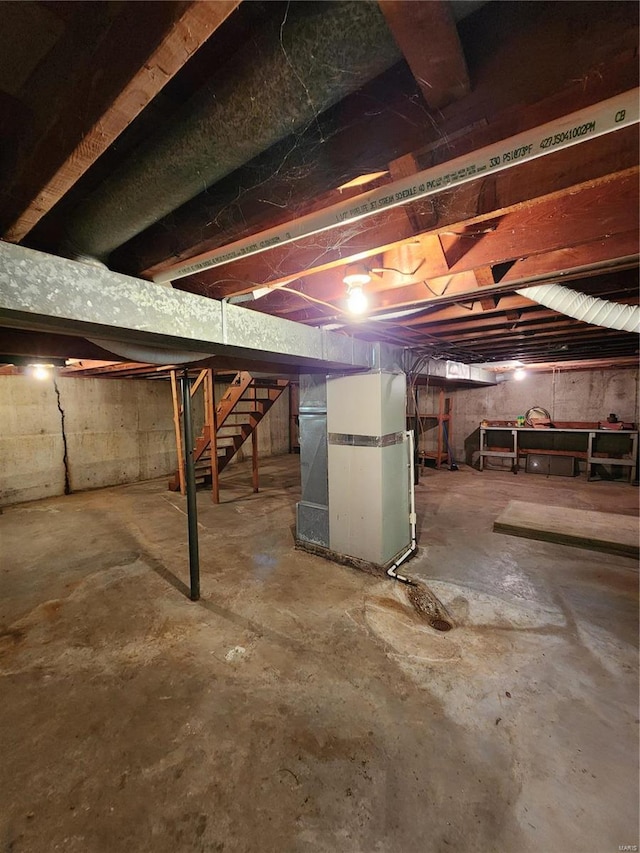 basement featuring heating unit