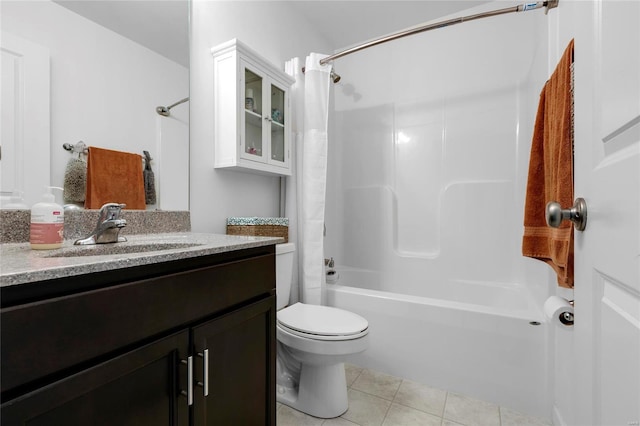 full bathroom with vanity, tile patterned floors, toilet, and shower / tub combo with curtain