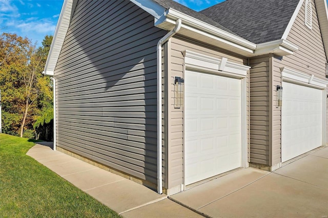 view of side of home with a garage