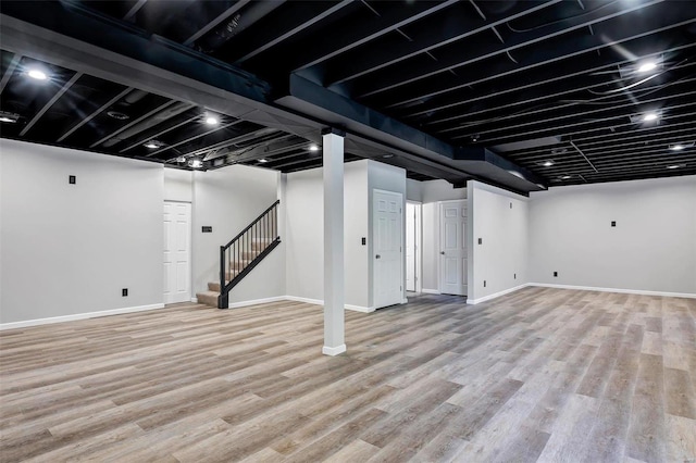 basement with light wood-type flooring