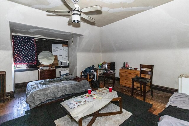 bedroom featuring wood-type flooring and ceiling fan