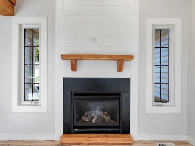 interior details featuring wood-type flooring