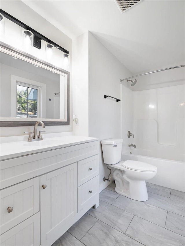 full bathroom featuring vanity,  shower combination, and toilet