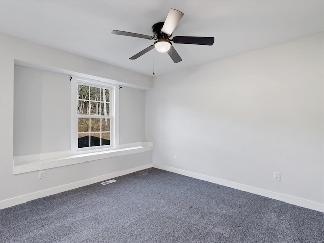 unfurnished room featuring carpet flooring and ceiling fan